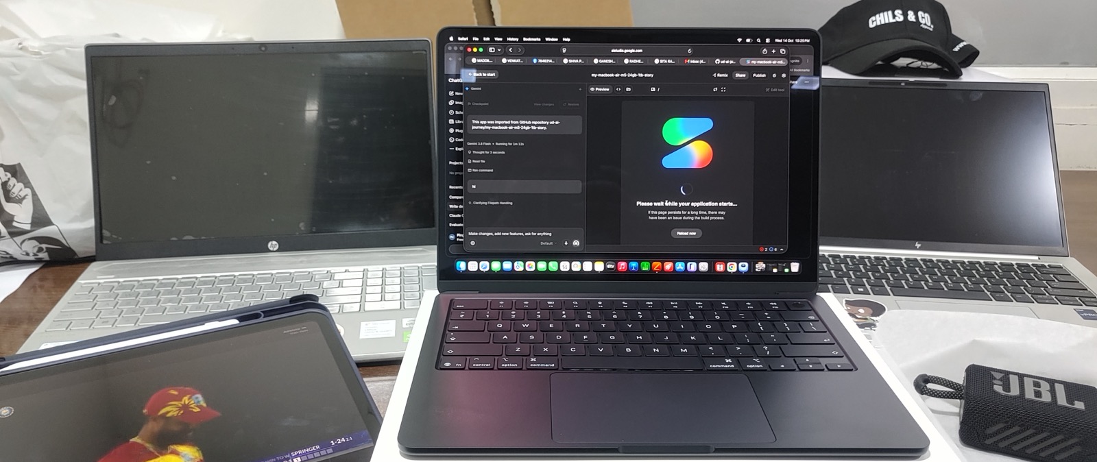 My old HP laptops beside the new MacBook Air at my office